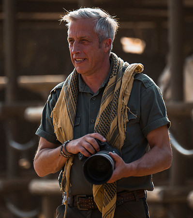 Andrew Yates, conservation wildlife photographer, in the field with camera